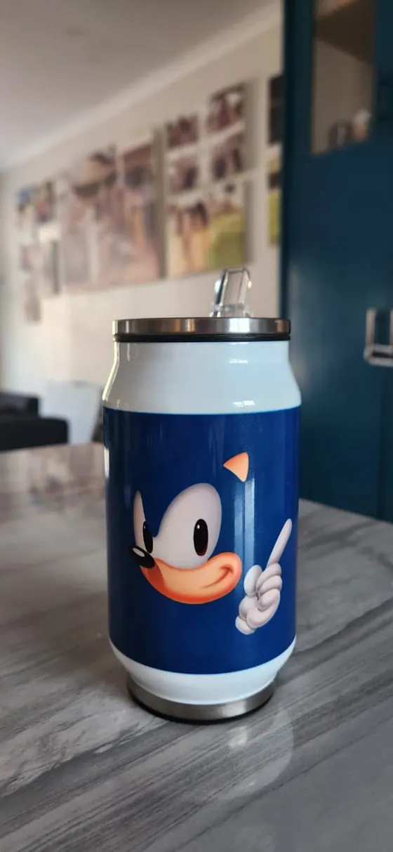 Navy can tumbler printed with a blue cartoon hedgehog character