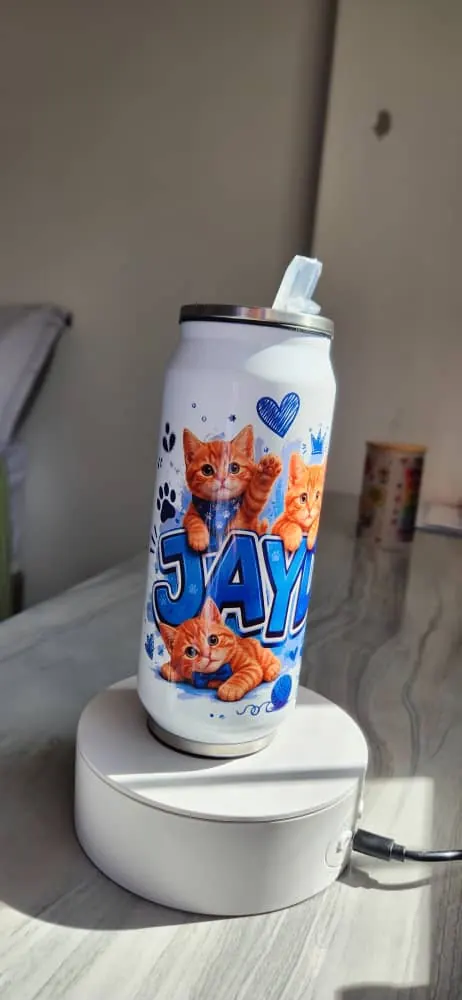 Tall can tumbler printed with ginger kittens and the name JAYN in blue