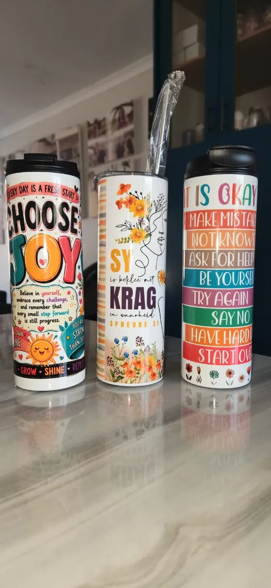 Three tumblers side by side printed Choose Joy, Spreuke 31 and It Is Okay affirmations